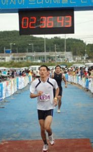 Peter Kim completing international triathlon